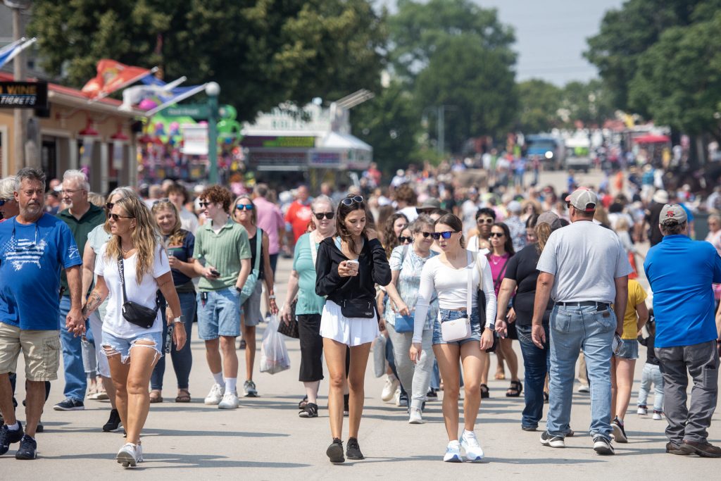 Wisconsin State Fair attendees explore the fairgrounds Thursday, July 31, 2025, in West Allis, Wis. Angela Major/WPR