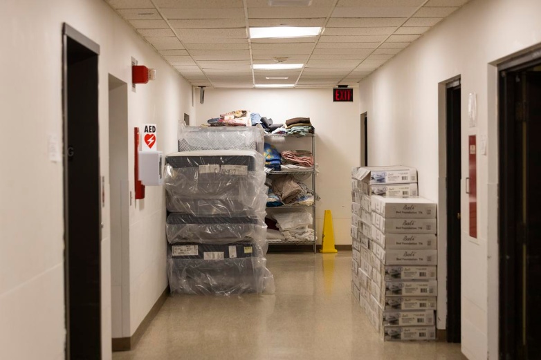 New, unopened mattresses are stacked in the hallway, Monday, Aug. 25, 2025, at Klein Hall in Chippewa Falls, Wis. (Joe Timmerman / Wisconsin Watch)