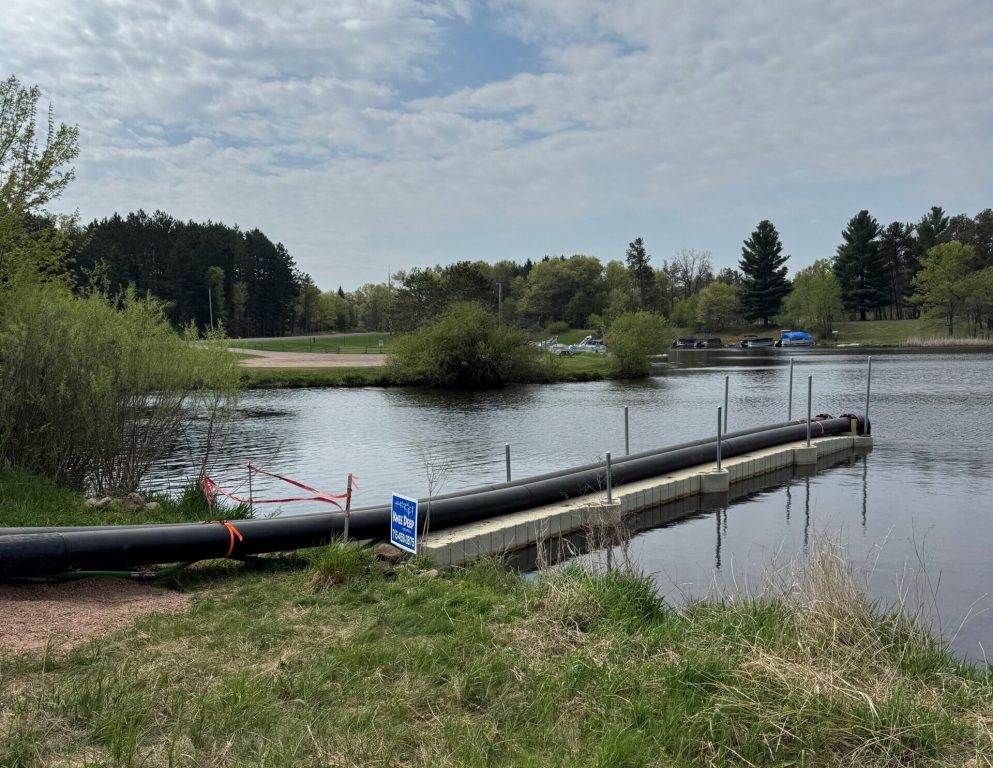 A pipe running from a Moleaer unit into Lake Camelot in Rome, Wis. The pipes run lake water into the unit, where the water is aerated with nanobubbles before being pumped back into the lake. Photo courtesy of Moleaer