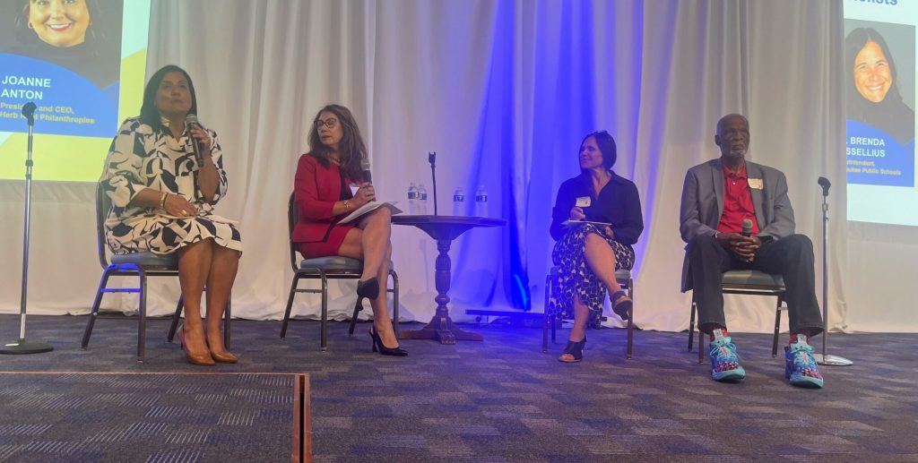 Members of the new Milwaukee Reading Coailtion at the Greater Milwaukee Committee on Sept. 15, 2025. From left, JoAnne Anton, Laura Gutierrez, Brenda Cassellius, Howard Fuller. Corrinne Hess/WPR