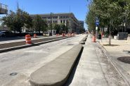 Protected bike lane construction on W. Michigan Street. Photo by Jeramey Jannene.