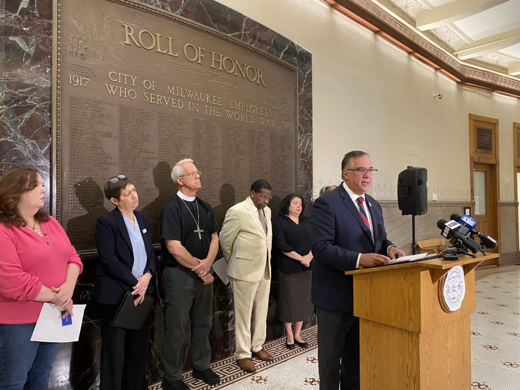 Community advocates speak at press conference in Milwaukee, Wis. after Sept. 8, 2025 Supreme Court decision on ICE raids. Steph Conquest-Ware/WPR