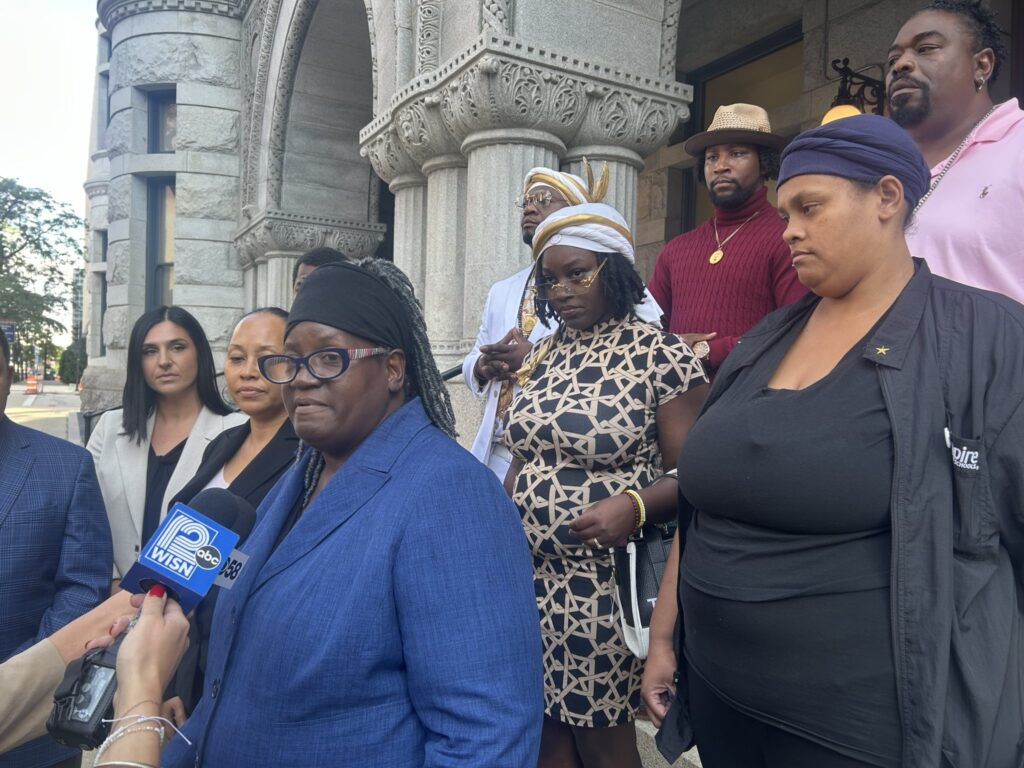  The Cole family and their attorney’s talk to press outside the federal courthouse. (Photo by Isiah Holmes/Wisconsin Examiner)