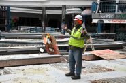 Benji Timm guides demolition contractors on a tour of Northridge Mall in May 2024. Photo by Jeramey Jannene.