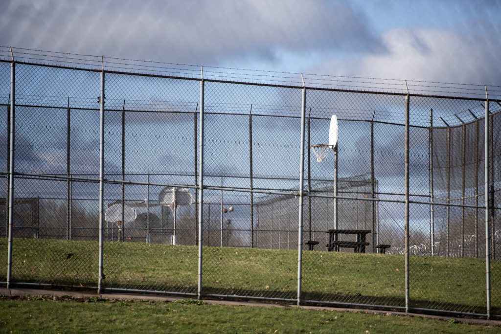 Basketball goals and picnic tables are located behind the living units at Lincoln Hills youth prison Thursday, April 15, 2021, in Irma, Wis. Angela Major/WPR
