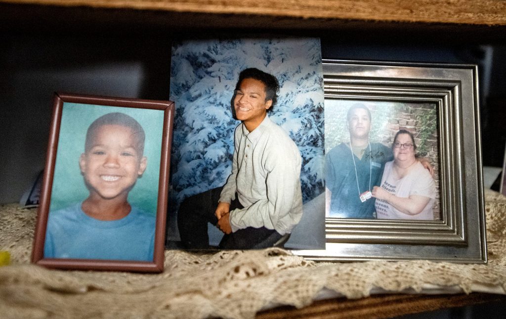 Photos of Jerrold Wellinger are on display in his mother Julie’s home in Milwaukee, Wis. Angela Major/WPR