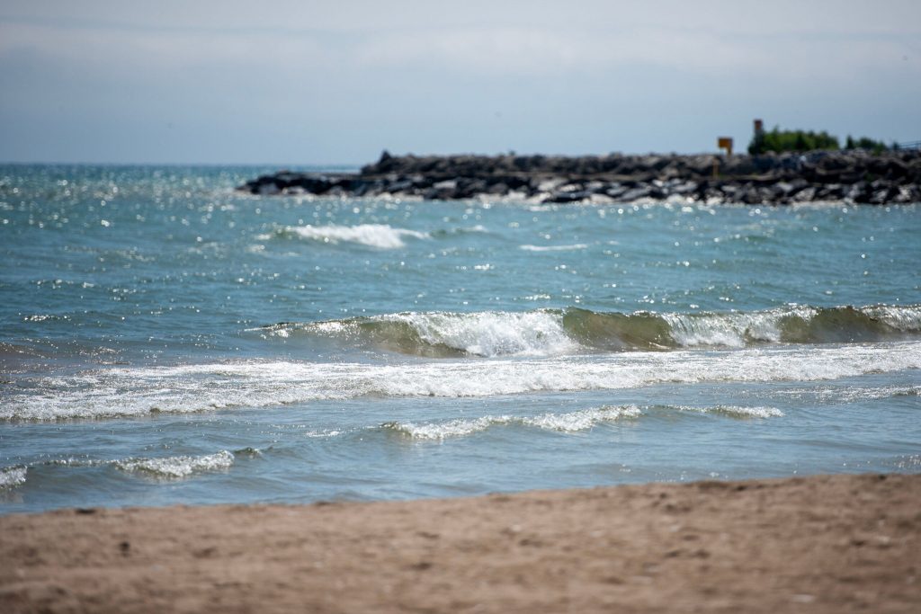Waves lap up onto the Lake Michigan shore Wednesday, July 9, 2025, in Sheboygan, Wis. Angela Major/WPR