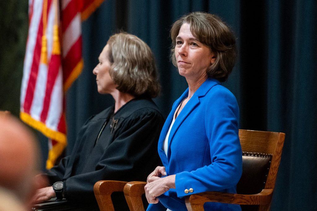 Justice-elect Susan Crawford takes a seat at her investiture Friday, Aug. 1, 2025, at the Wisconsin State Capitol in Madison, Wis. Angela Major/WPR