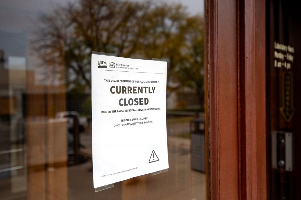 A sign is posted outside the USDA Forest Products Laboratory building Thursday, Oct. 30, 2025, in Madison, Wis. Angela Major/WPR
