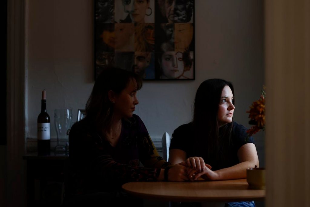 Sydney Marz, left, and Lauren Engle are graduates of Madison East High School. They both described wanting to avoid school and a deep distrust of teachers and school administrators after experiencing educator sexual misconduct. (Ruthie Hauge / The Cap Times)