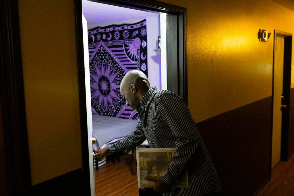 Darnell Price closes the door of his apartment, Oct. 1, 2025, in Milwaukee. Finding and maintaining housing were among the challenges he faced upon being released from prison. (Joe Timmerman / Wisconsin Watch)