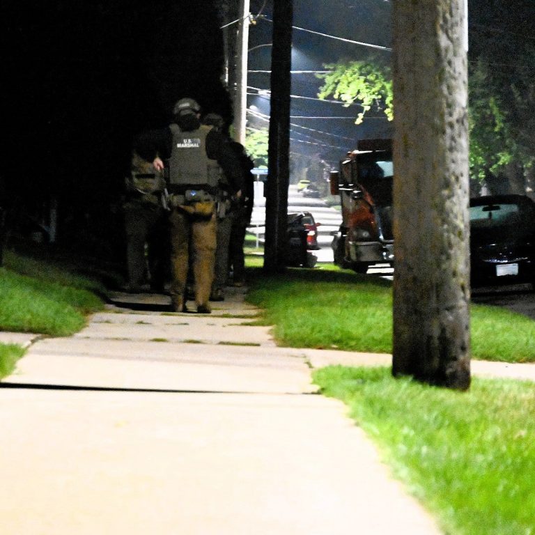 The FBI’s Milwaukee field office posted this photo of federal officials on a sidewalk in Manitowoc County to social media on Sept. 25, 2025. Photo courtesy of the FBI
