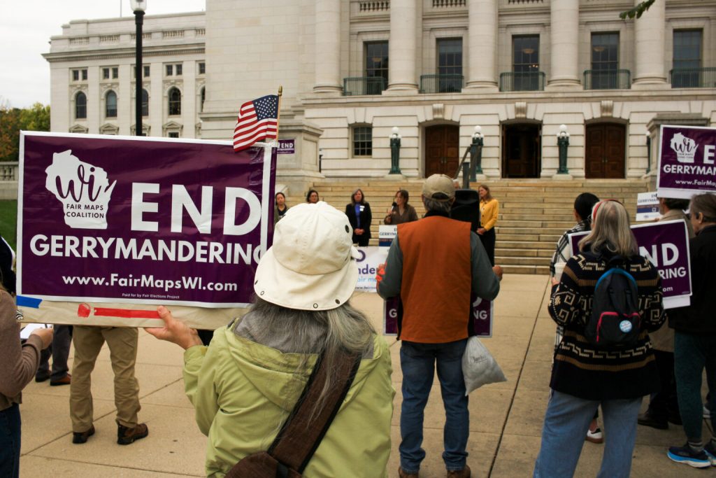 Democrats and pro-democracy organizations held a rally Thursday to call for the creation of an independent redistricting commission. (Henry Redman | Wisconsin Examiner)