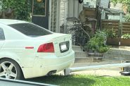 A vehicle that crashed into and knockdown a traffic signal in Bay View. Photo by Jeramey Jannene.
