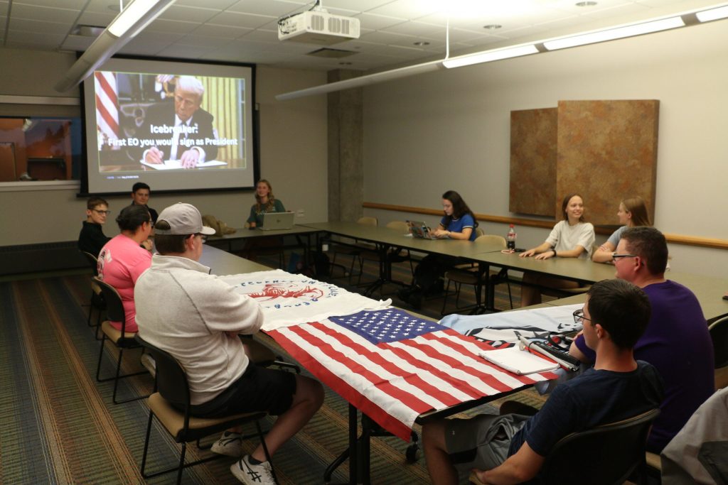 Members of the University of Wisconsin-River Falls College Republicans gathered Oct. 1, 2025, for their monthly chapter meeting, which started with an icebreaker discussion about what their first executive orders would be if elected president. Rich Kremer/WPR
