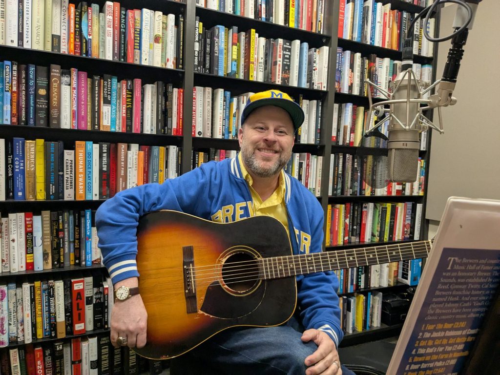 Nate Gibson performs a live rendition of “Fear the Beer” from his new album at the WPR studio in Madison, Sept. 24, 2025. Richelle Wilson/WPR