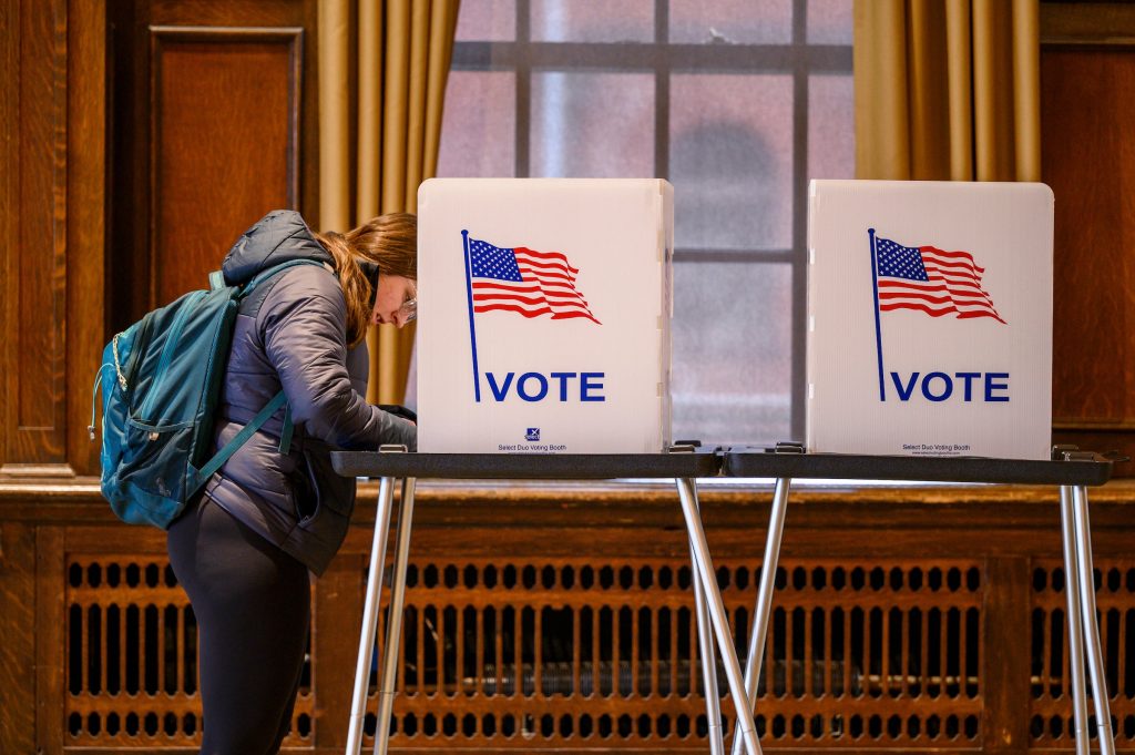 On Election Day, April 4, 2023, voters stand at voting booths in Tripp Commons at the Memorial Union at the University of Wisconsin–Madison, one of several official polling places for UW–Madison students living on campus. Althea Dotzour/UW–Madison