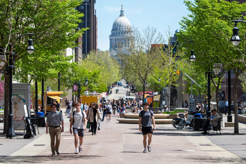 UW-Madison students walk on campus Tuesday, May 6, 2025, in Madison, Wis. Angela Major/WPR