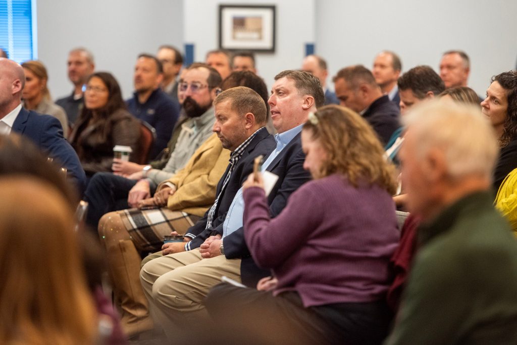Rep. Mark Born, R-Beaver Dam sits in the crowd at a Meta data center announcement Wednesday, Nov. 12, 2025, in Beaver Dam, Wis. Angela Major/WPR