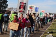 Protesters march outside of a new ICE facility being constructed in Milwaukee. (Photo by Isiah Holmes/Wisconsin Examiner)