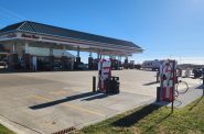 A Kwik Trip station in Mount Horeb, Wisconsin, was among the locations chosen for new charging stations in the first round of Wisconsin’s build-out for its charging station network under the National Electric Vehicle Infrastructure program (NEVI), part of the bipartisan infrastructure law enacted during President Joe Biden’s term in office. (Photo by Erik Gunn/Wisconsin Examiner)
