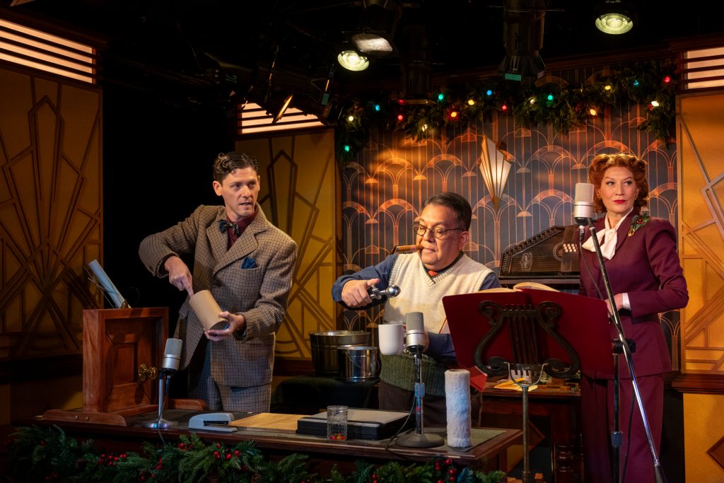 Milwaukee Repertory Theater presents It’s A Wonderful Life: A Live Radio Play in the Stackner Cabaret October 31 – December 21, 2025. Pictured L to R: Wade Elkins, David Flores, Melinda Parrett. Photo by Mark Frohna.