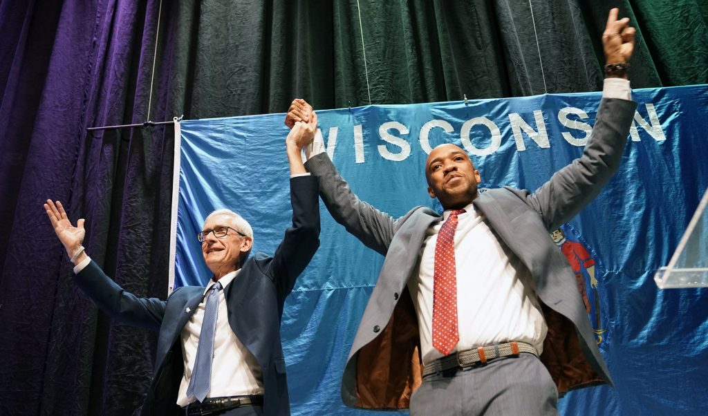 Democratic gubernatorial candidate Tony Evers and lieutenant governor candidate Mandela Barnes celebrate at The Orpheum Theater early Wednesday, Nov. 7, 2018. Marisa Wojcik/Wisconsin Public Television