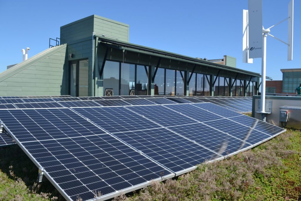 The roof of the Hotel Verdant in Downtown Racine is topped with a green roof planted with sedum and covered with solar panels. (Wisconsin Examiner photo)