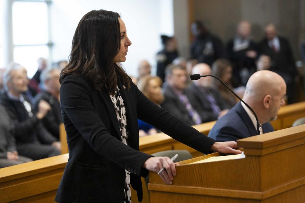 Assistant Attorney General Adrienne Blais, left, and Assistant Attorney General Jacob Corr, right, represent the state of Wisconsin as Jim Troupis, a GOP attorney and former judge, makes his initial appearance in court Dec. 12, 2024, at the Dane County Courthouse in Madison, Wis. (Joe Timmerman / Wisconsin Watch)