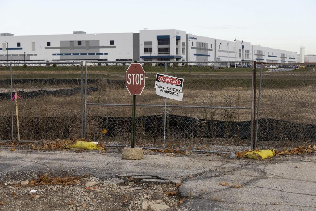 A demolition sign is posted at the former site of the We Energies Power Plant on Nov. 13, 2025, in Pleasant Prairie, Wis. (Joe Timmerman / Wisconsin Watch)