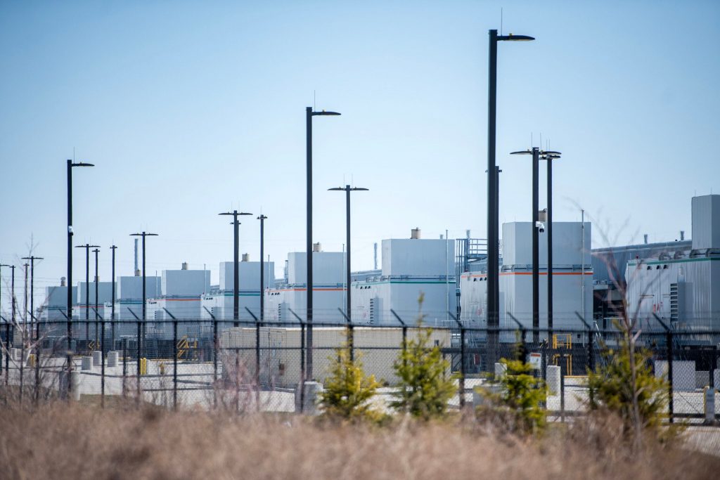 A Microsoft data center is situated near a hiking trail Tuesday, April 8, 2025, in West Des Moines, Iowa. Angela Major/WPR
