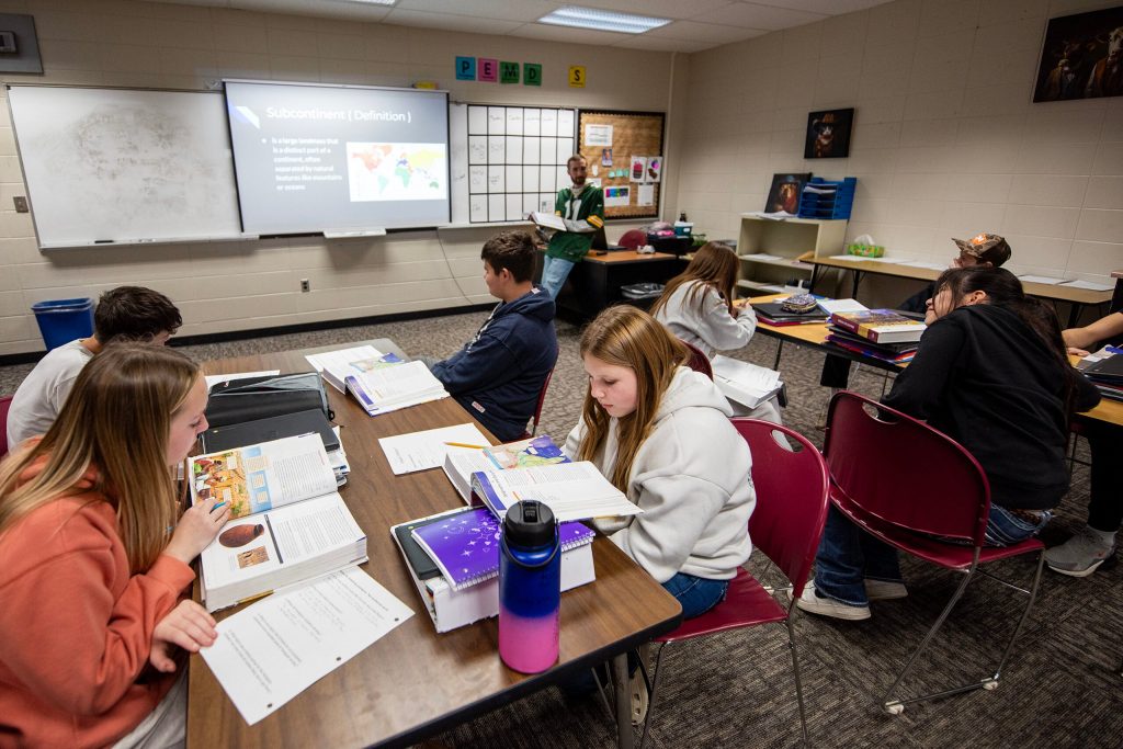 High school students read from a textbook in class Monday, Nov. 10, 2025, in Crandon, Wis. Angela Major/WPR