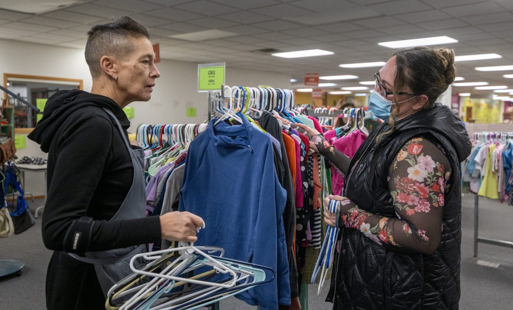Community Space executive director Kristine Zaballos, left, speaks with volunteer Soledad Alvarez, right, on Wednesday, Jan. 7, 2026, in Whitewater, Wis. Angela Major/WPR