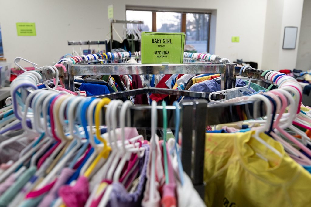 Clothes are hung up for people who need them Wednesday, Jan. 7, 2026, at the Community Space in Whitewater, Wis. Angela Major/WPR
