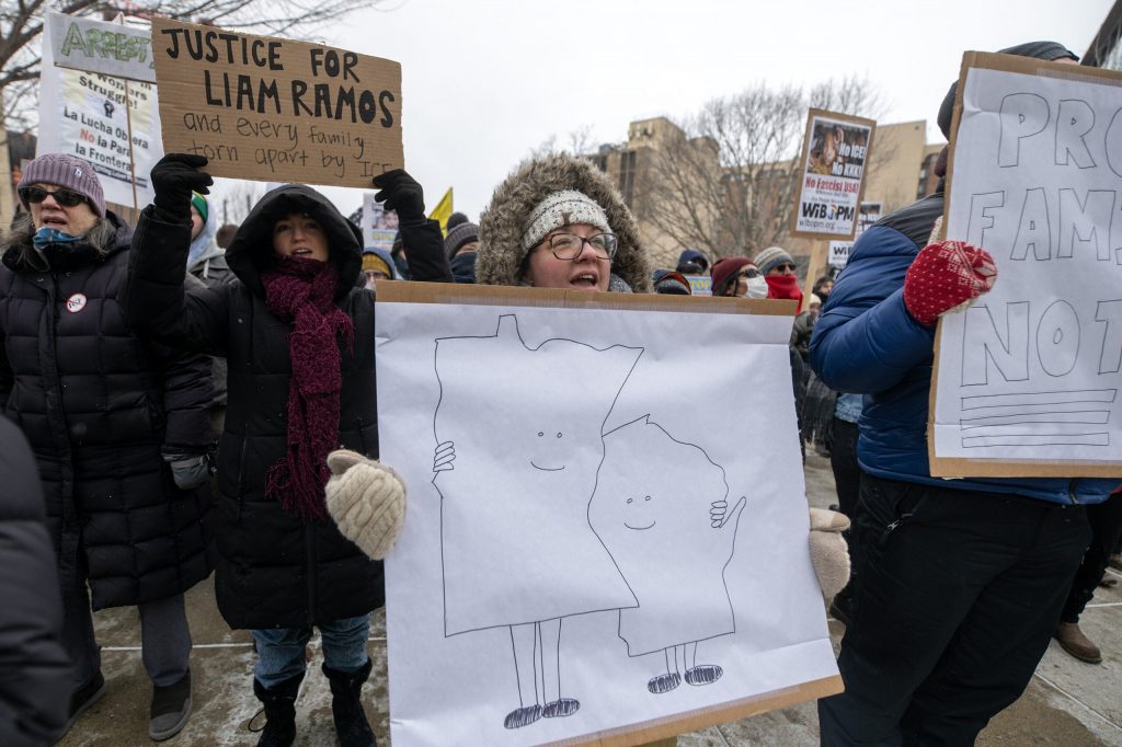 Protesters gather to protest ICE and the Trump administration Sunday, Jan. 25, 2026, in Madison, Wis. The protest came after a Border Patrol agent shot and killed Alex Pretti in Minneapolis the day before. Angela Major/WPR
