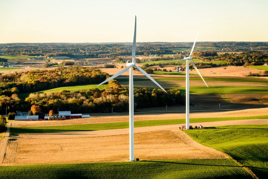 Windmill turbines in rural Wisconsin farmland northeast of Madison near Baraboo are pictured in an early morning aerial taken from a helicopter on Oct. 23, 2018. Bryce Richter/UW-Madison