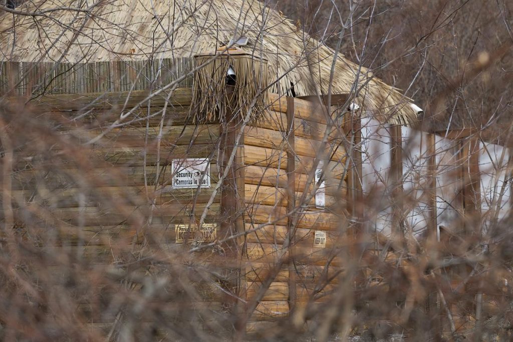 Signs are posted on Daniel Domagala’s beach compound along Lake Michigan just north of Atwater’s public swimming beach in the village of Shorewood, Wis., Jan. 8, 2026. (Joe Timmerman / Wisconsin Watch)