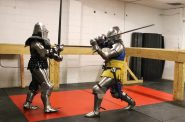 Volivia Bogust (left) and Tyler Gren spar with swords. Photo taken Feb. 9, 2026 by Sophie Bolich.