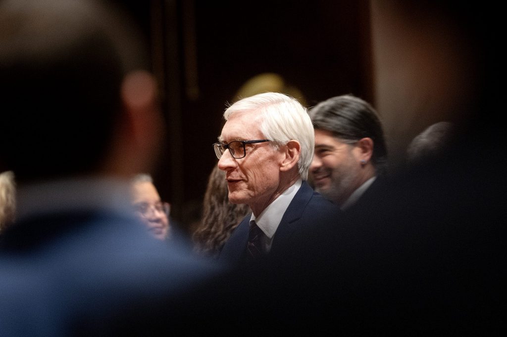 Gov. Tony Evers enters the Wisconsin Assembly Chambers before delivering the State of the State address Tuesday Feb. 17, 2026, at the Wisconsin State Capitol in Madison, Wis. Angela Major/WPR