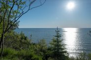 A view of Lake Michigan from Lion’s Den Gorge Nature Preserve near Grafton. The Ozaukee County Park,&nbsp;one of the few remaining undeveloped bluffs along Lake Michigan, was preserved with funding from the Knowles-Nelson Stewardship Program.&nbsp;Joseph Gage/ CC BY-SA 2.0