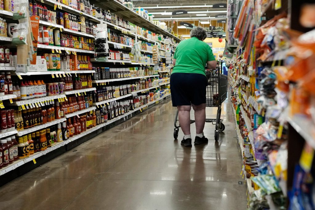 A person shops for condiments, which are covered by the USDA Supplemental Nutrition Assistance Program, or SNAP, at a grocery store Friday, Oct. 31, 2025, in Nashville, Tenn. George Walker IV