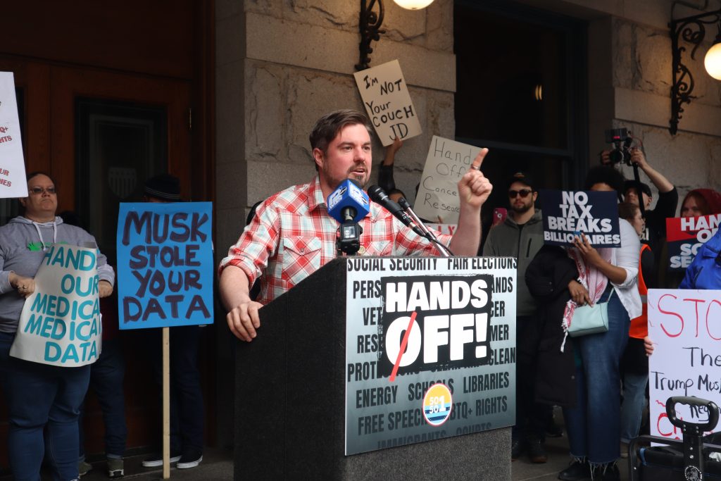 Alex Brower, a recently elected alderman in Milwaukee, speaks during a protest outside of the Federal Courthouse in Milwaukee. (Photo by Isiah Holmes/Wisconsin Examiner)