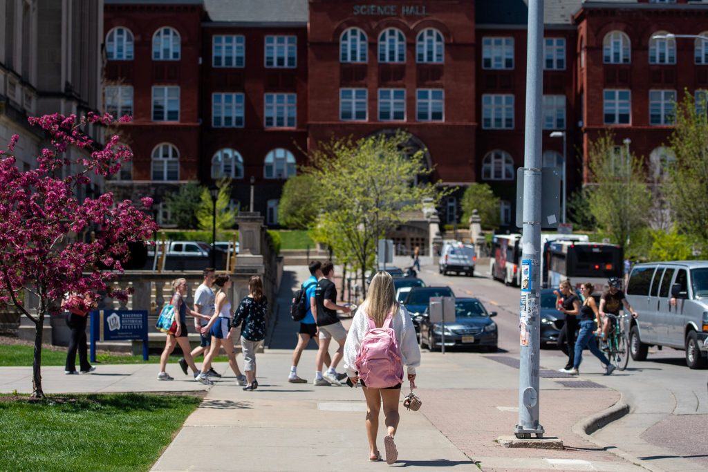 UW-Madison students walk on campus Tuesday, May 6, 2025, in Madison, Wis. Angela Major/WPR