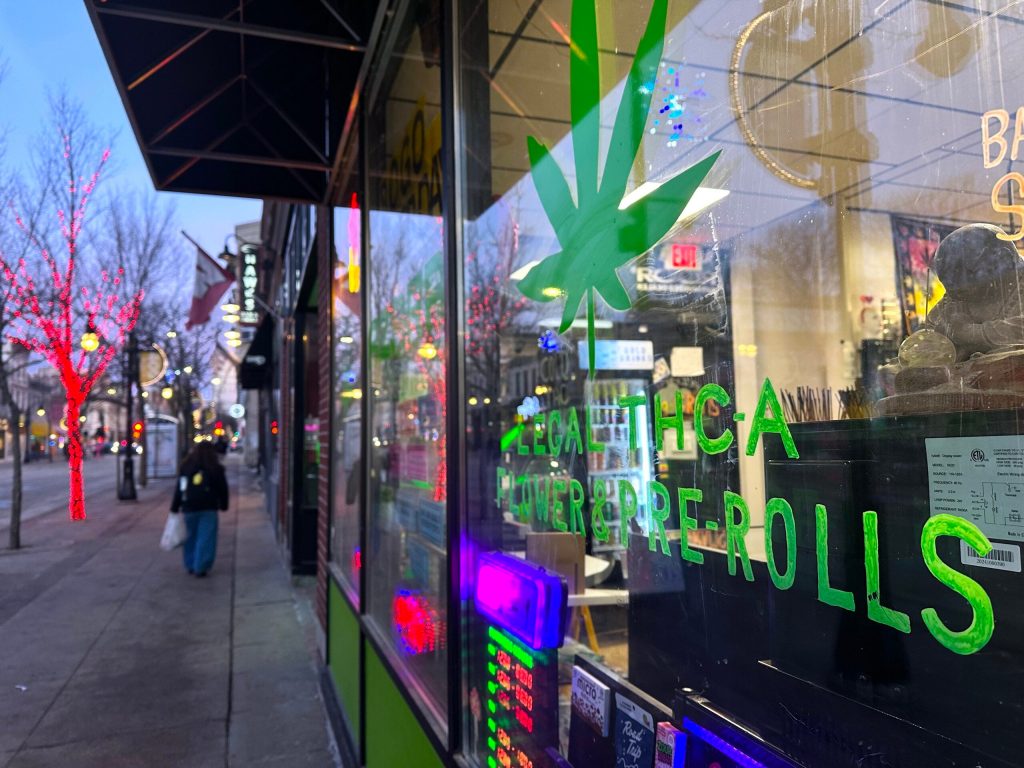 Storefronts advertise hemp-derived CBD and THC products on State Street in Madison, Wis., on Feb. 10, 2026. Anya van Wagtendonk/WPR