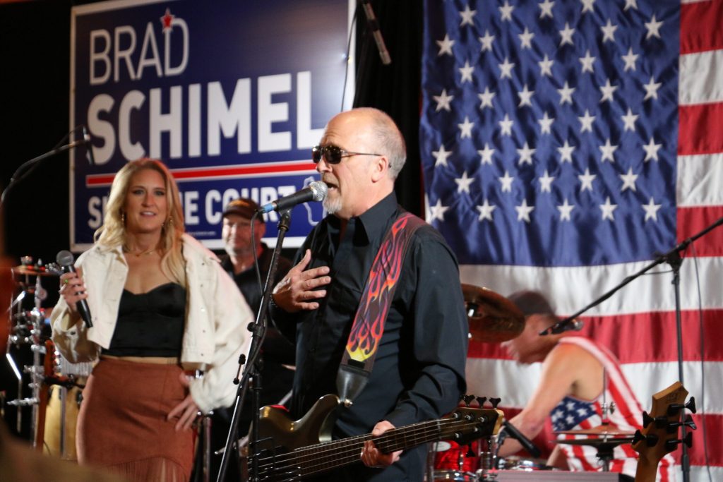 Conservative Supreme Court candidate Brad Schimel played rock and roll cover songs with his band at his election night party in Pewaukee on Tuesday, April 1, 2025. At around 9:30 p.m., Schimel told the crowd he had lost the election. Rich Kremer/WPR