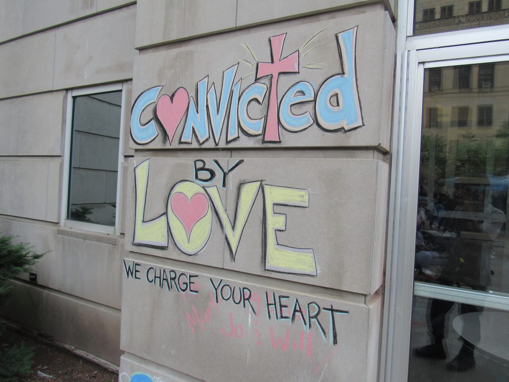 Protesters leave chalk messages outside the Milwaukee County Jail during the summer of protest in 2020. (Photo by Isiah Holmes)