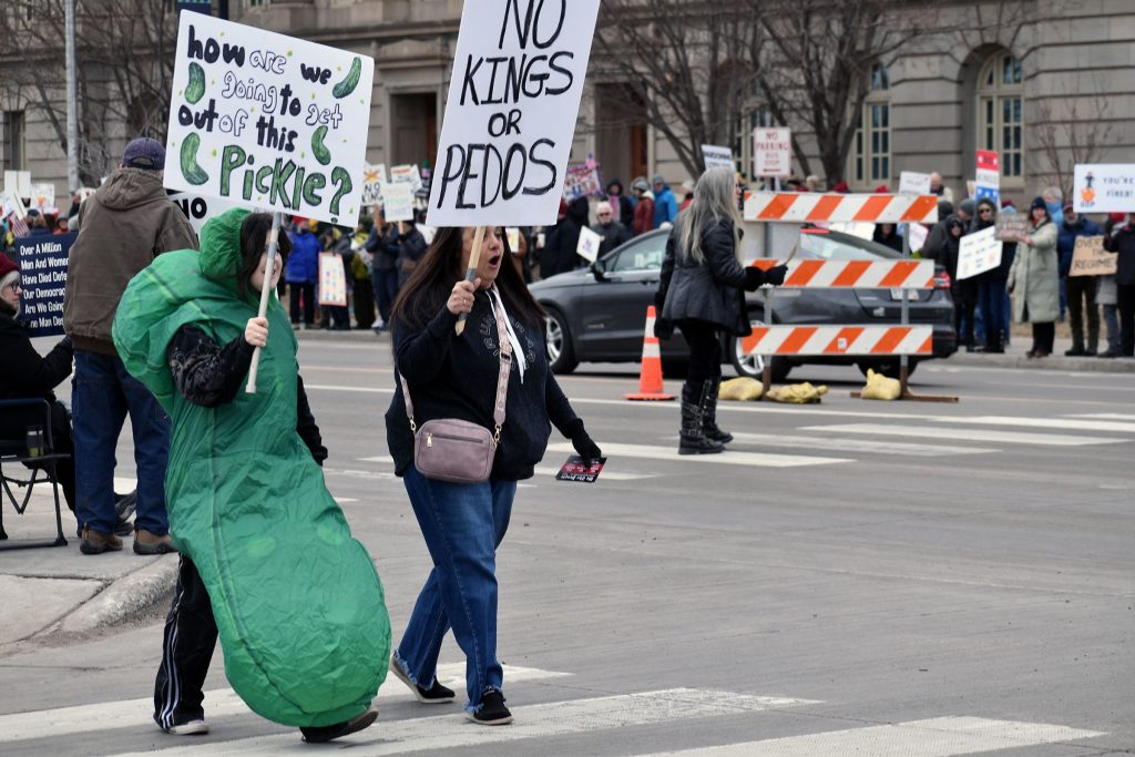 (left) Olivia Cashman, 14, and her mom Marylee Arrigo, of Minong, attend the No Kings rally in Superior on March 28, 2026. Danielle Kaeding/WPR