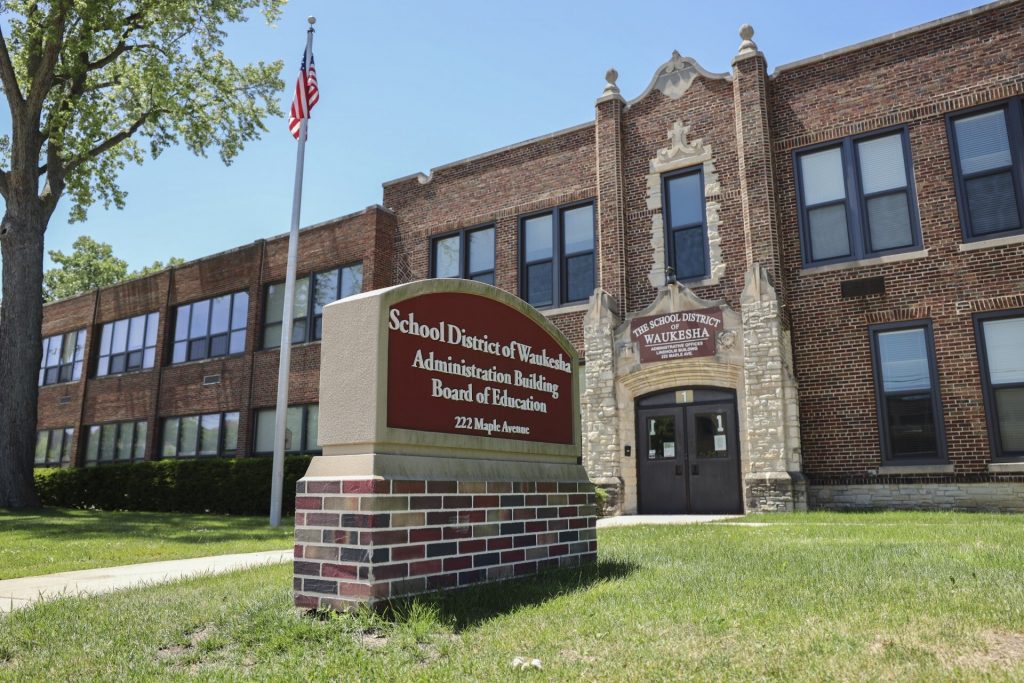 The School District of Waukesha administration building is seen on June 23, 2022, in Waukesha, Wis. Coburn Dukehart/Wisconsin Watch