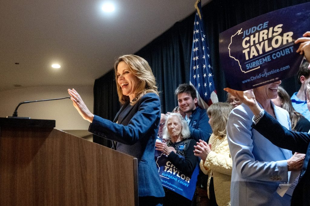 Judge Chris Taylor begins her acceptance speech Tuesday, April 7, 2026, at the Madison Concourse Hotel in Madison, Wis. Angela Major/WPR