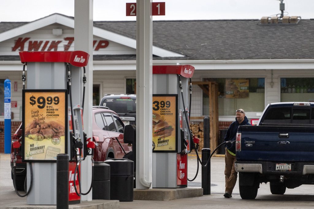 A driver gets gas Thursday, April 30, 2026, at a Kwik Trip in Milton, Wis. Angela Major/WPR